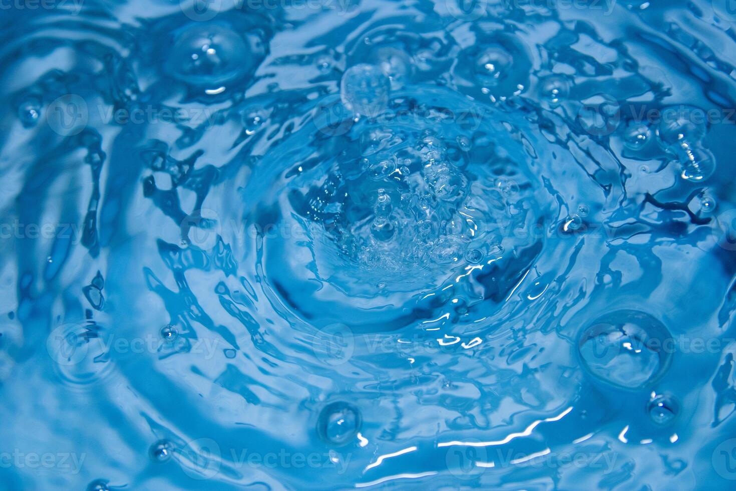 The blue water was so bright and waves from the beautiful waters sparked to a refreshing sensation. photo