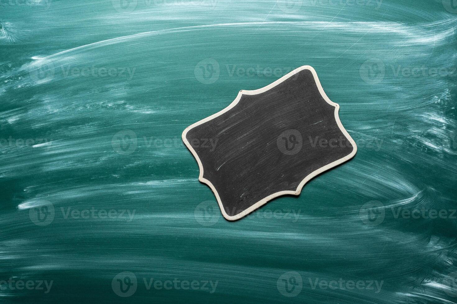 Empty card fot text on a green chalkboard photo