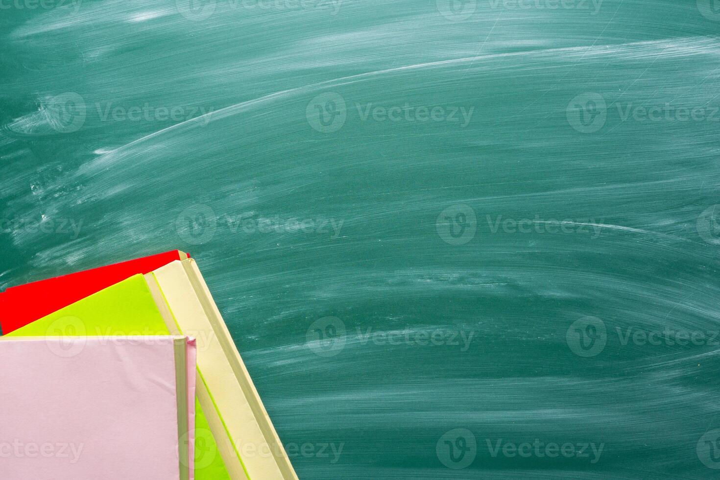 Education background on green chalkboard photo