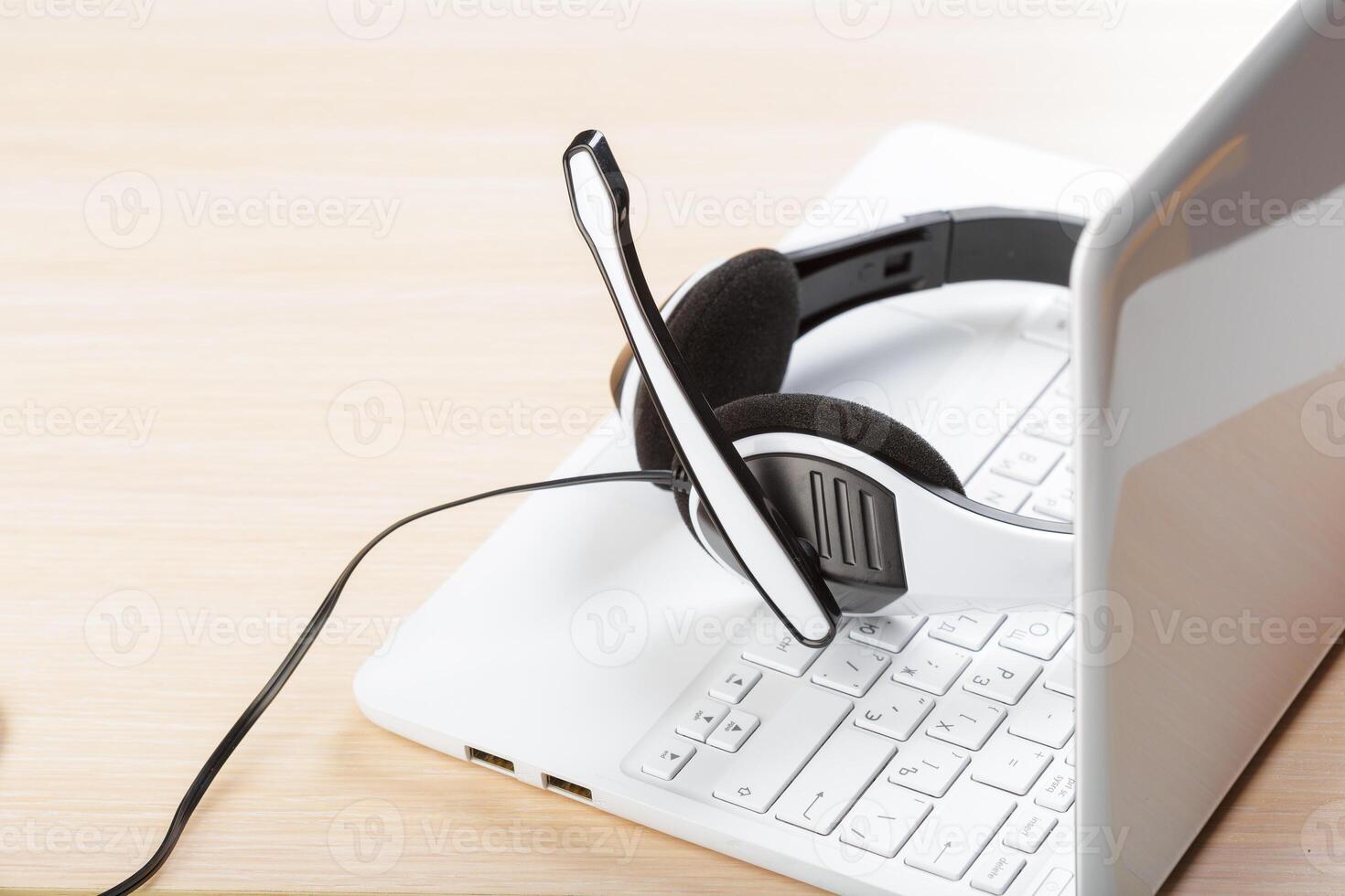 headset on keyboard computer laptop photo