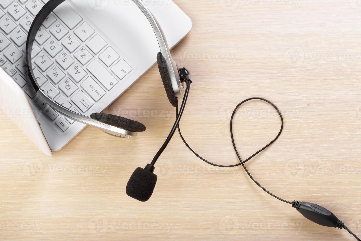 headset on keyboard computer laptop photo