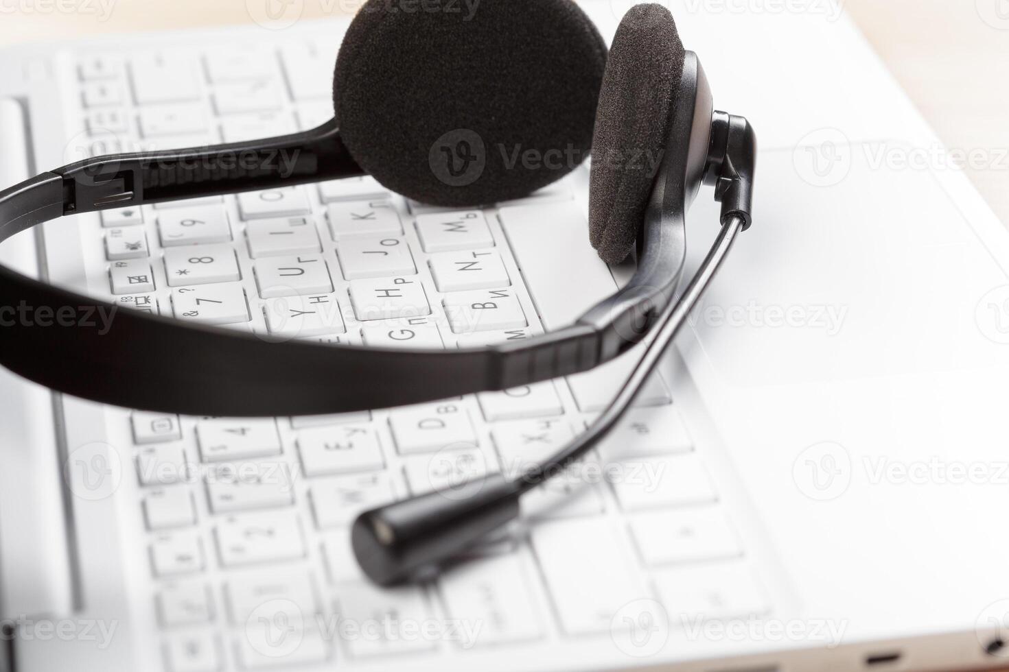 headset on keyboard computer laptop photo