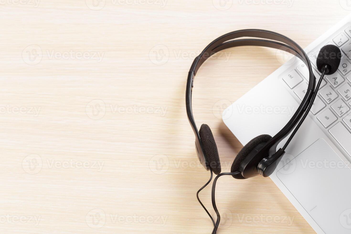 headset on keyboard computer laptop photo