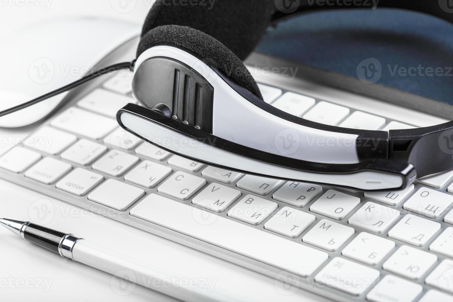 headset on keyboard computer laptop photo