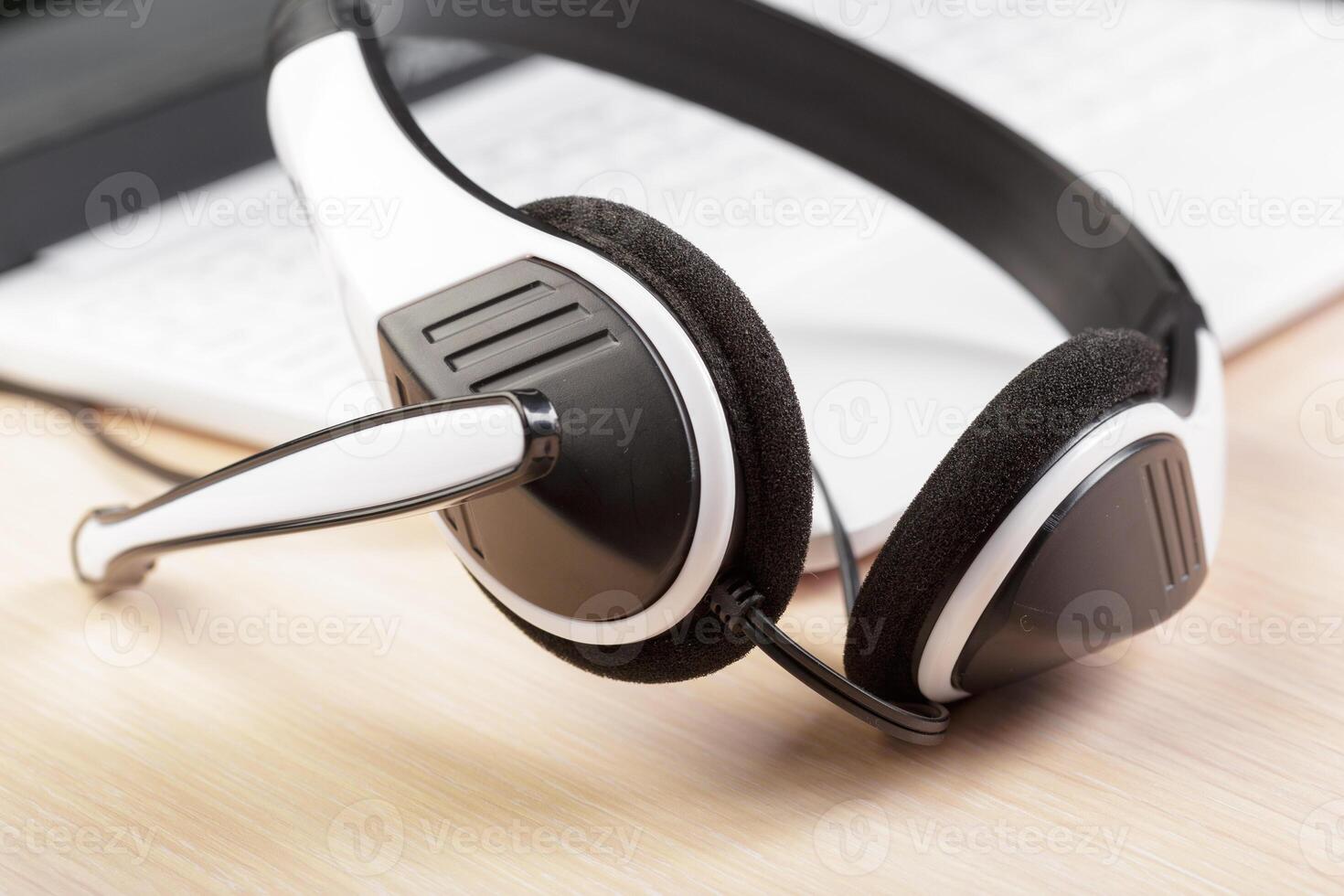 headset on keyboard computer laptop photo
