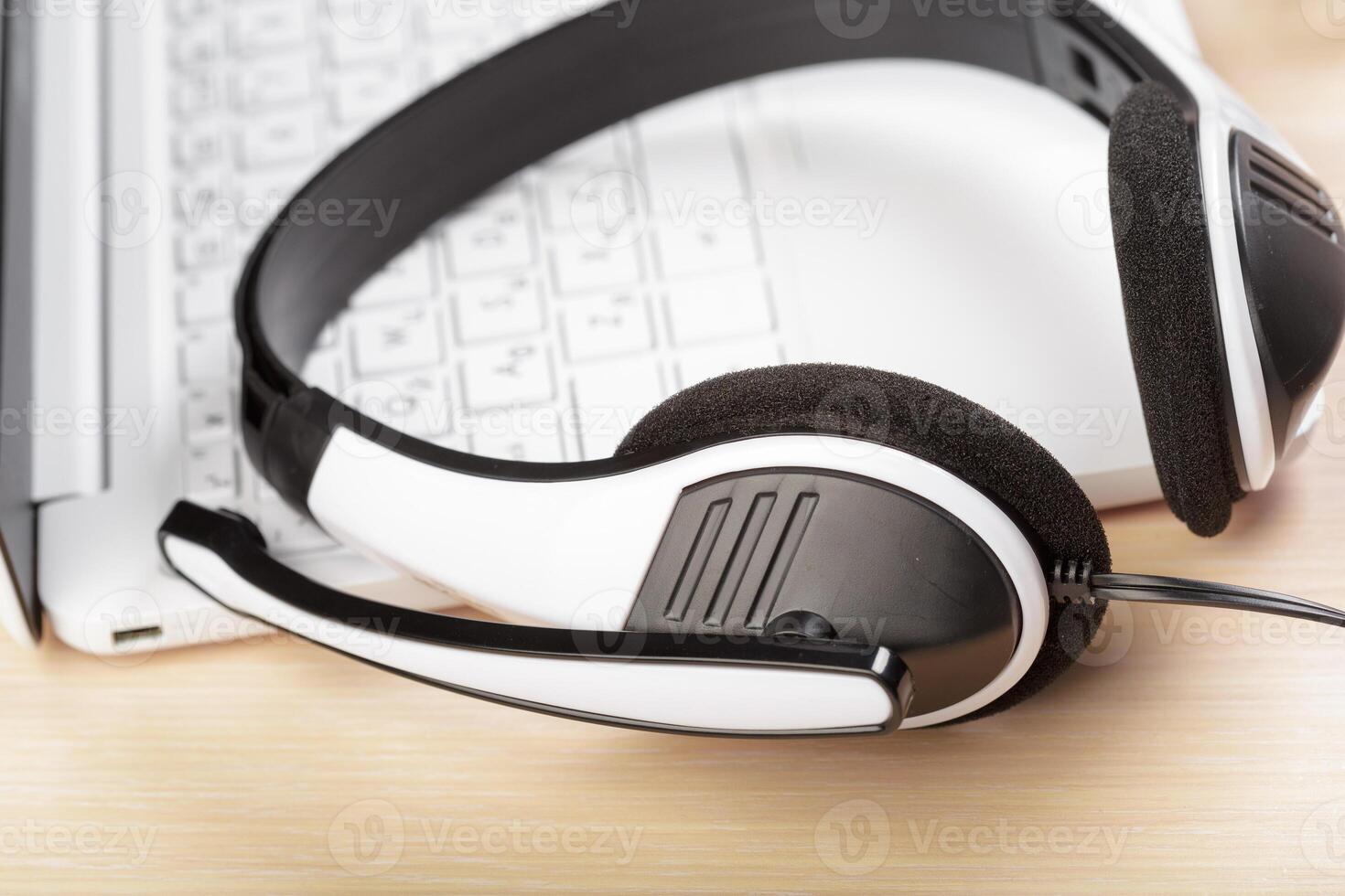 headset on keyboard computer laptop photo