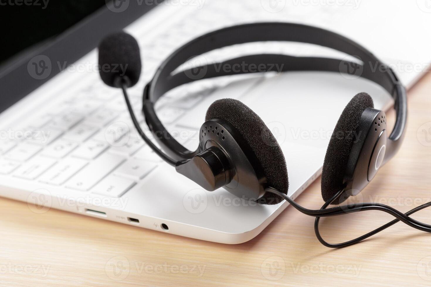 headset on keyboard computer laptop photo