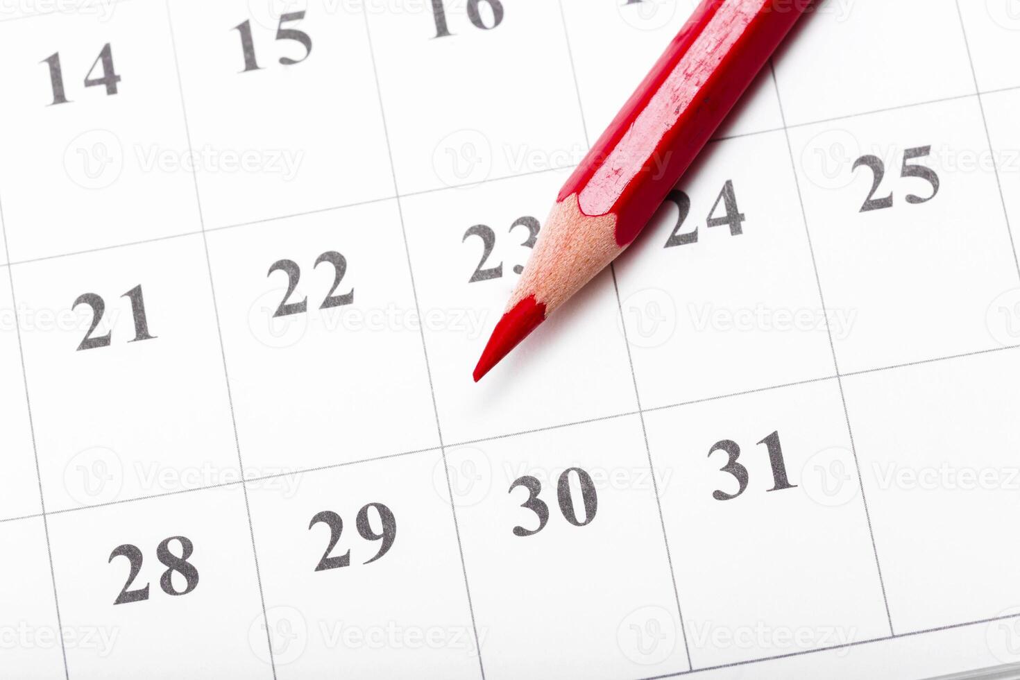 Check out the dates in a business calendar concept photo