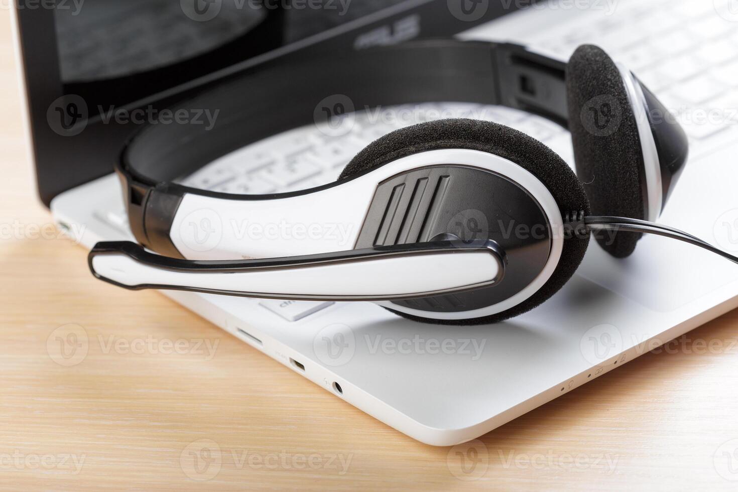 headset on keyboard computer laptop photo