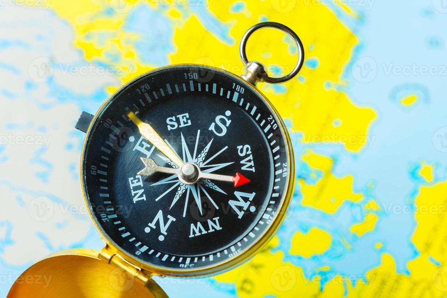 compass on map background travel photo