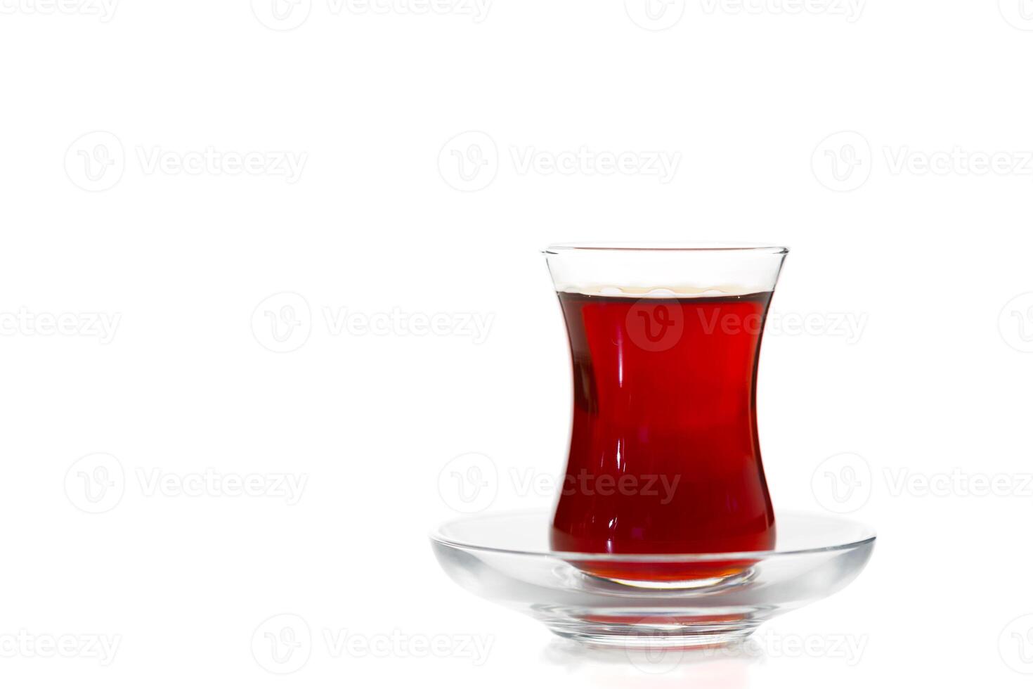 Turkish tea in traditional glass isolated on white background photo