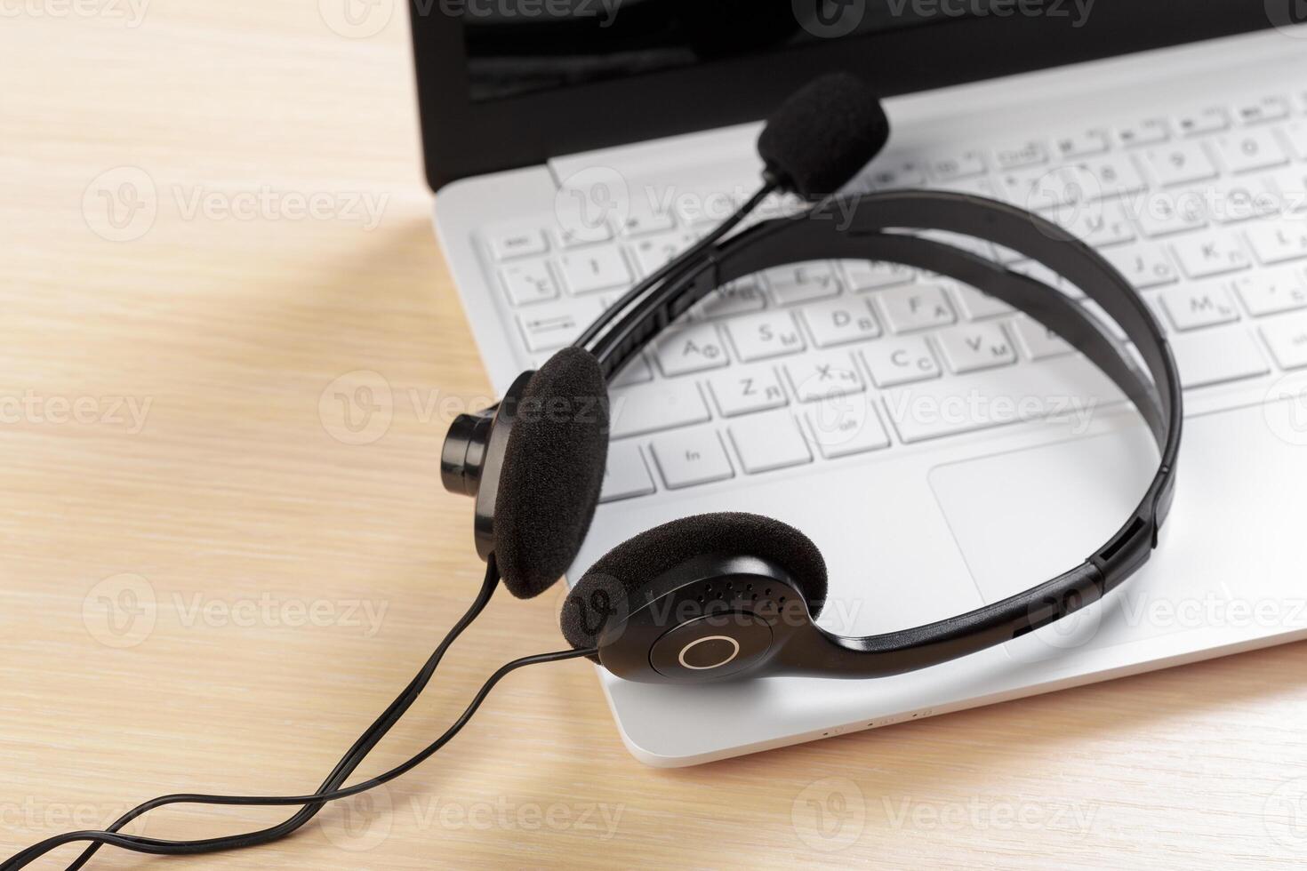 headset on keyboard computer laptop photo
