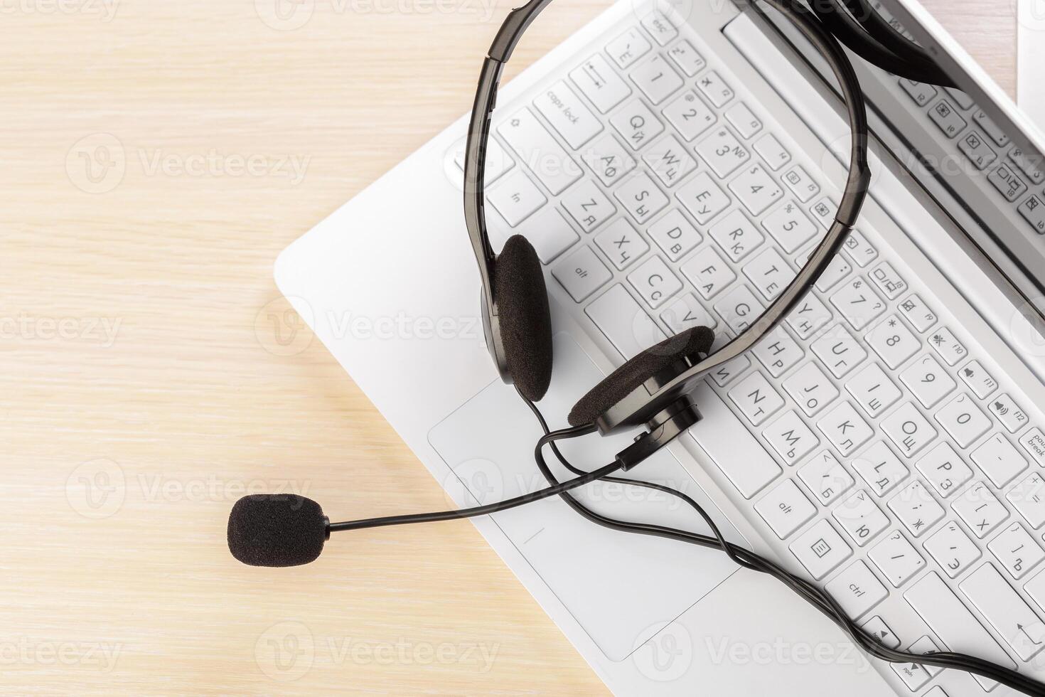 headset on keyboard computer laptop photo