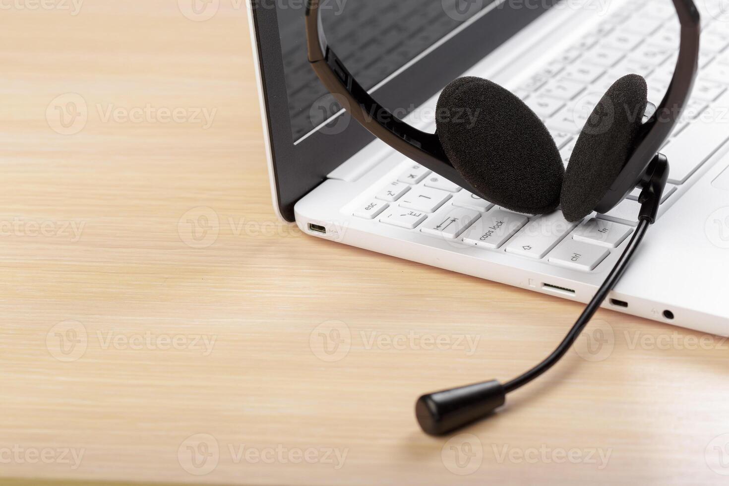headset on keyboard computer laptop photo