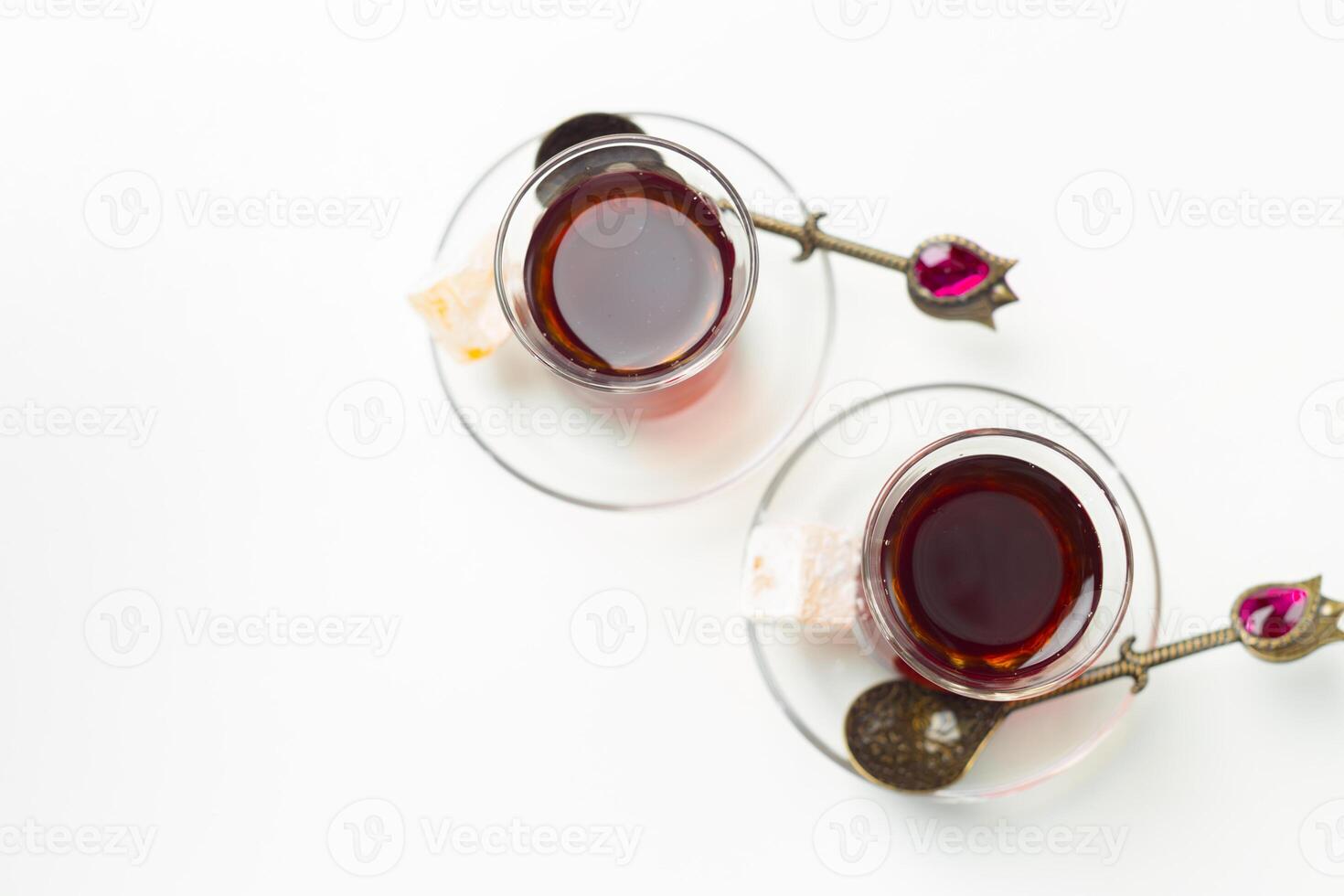 Turkish tea in traditional glass isolated on white background photo