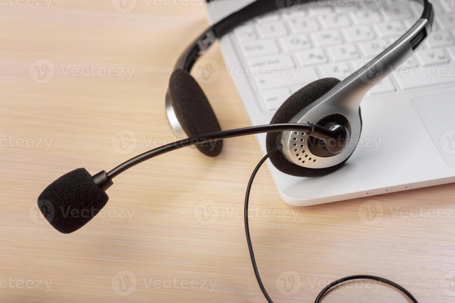 headset on keyboard computer laptop photo