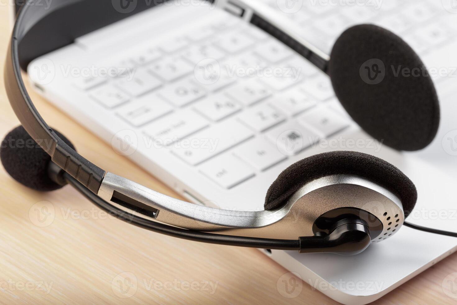headset on keyboard computer laptop photo