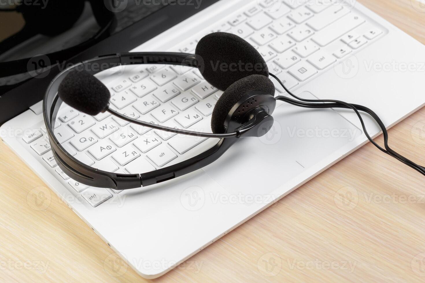 headset on keyboard computer laptop photo