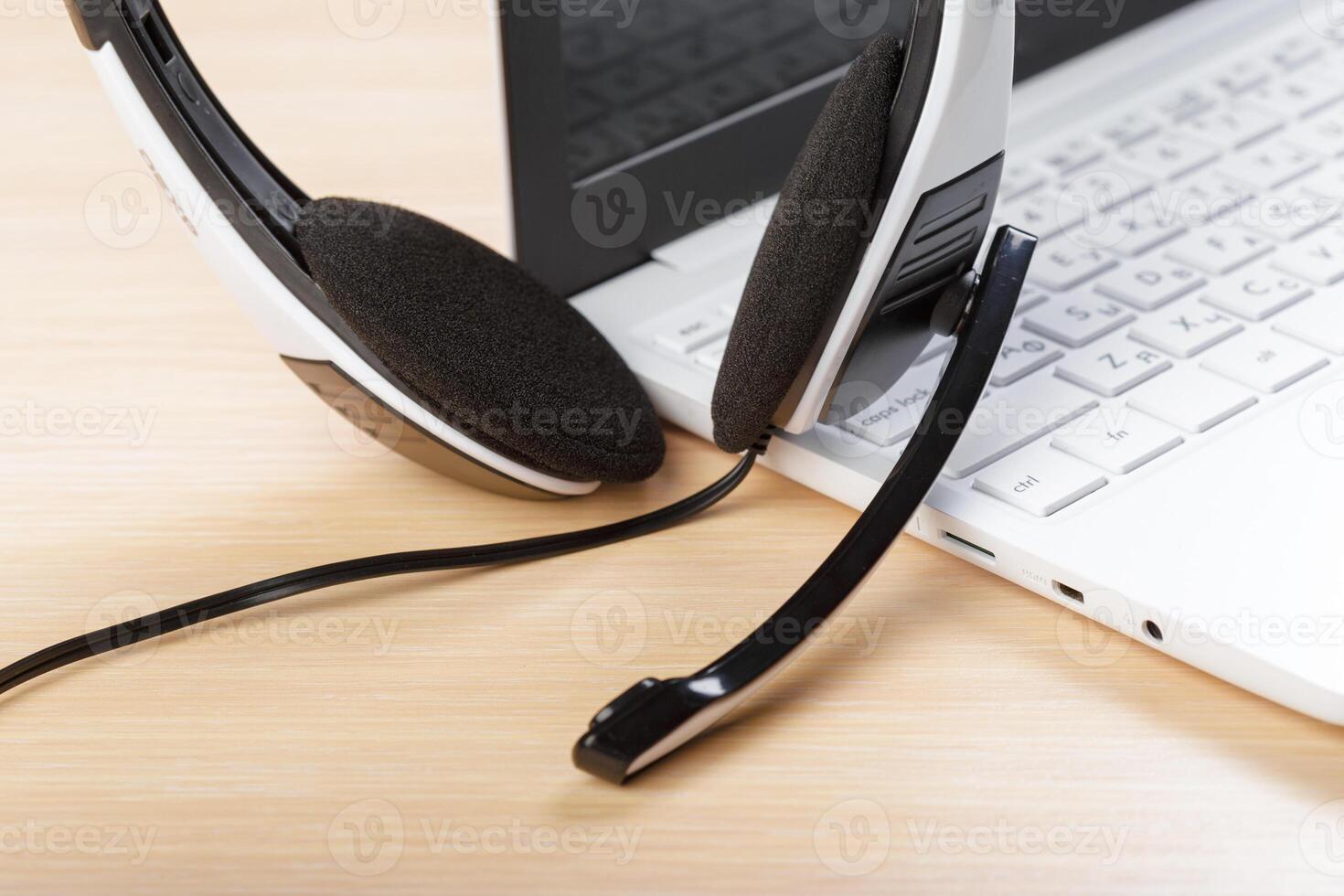 headset on keyboard computer laptop photo