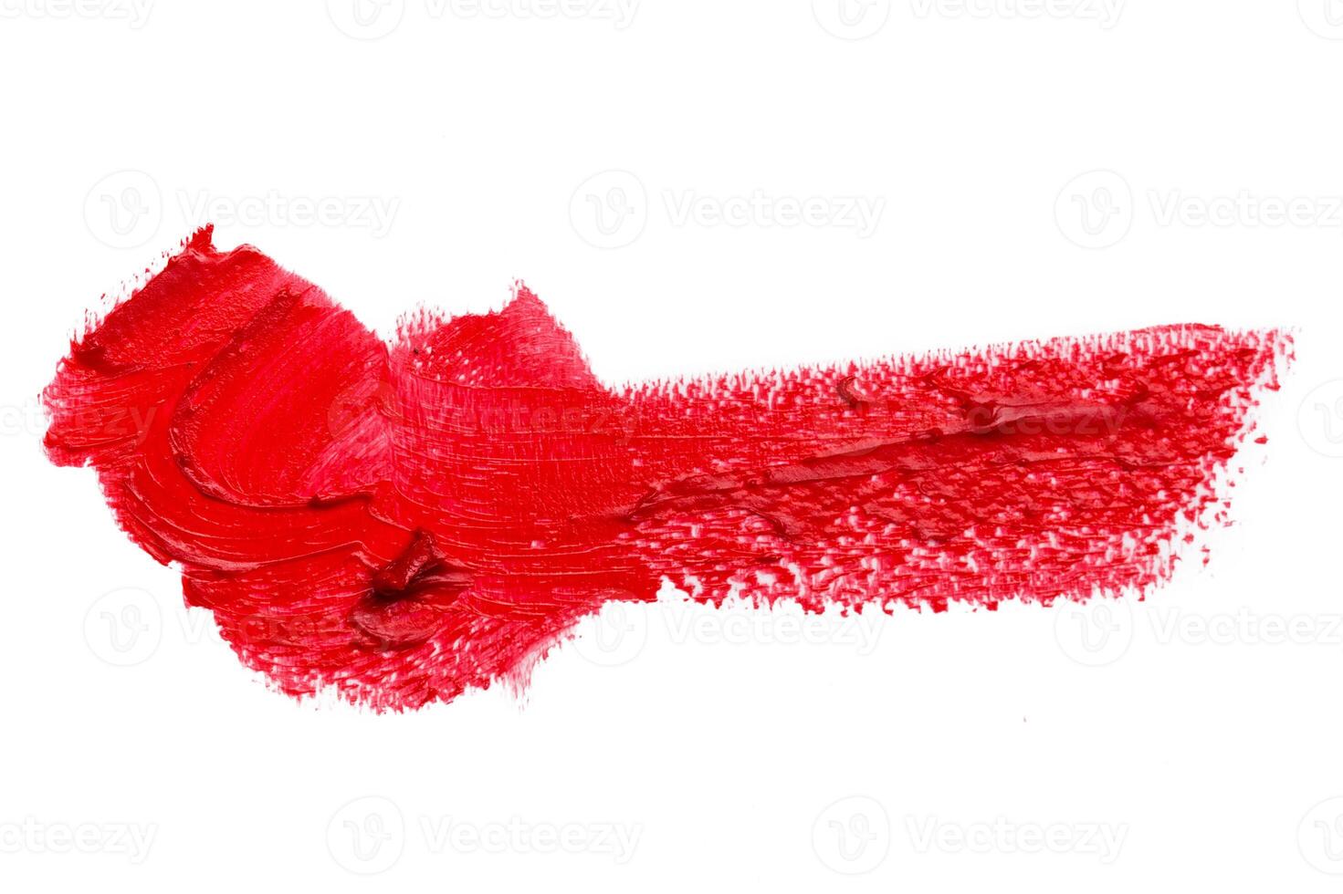 Smudged lipsticks isolated on white background photo