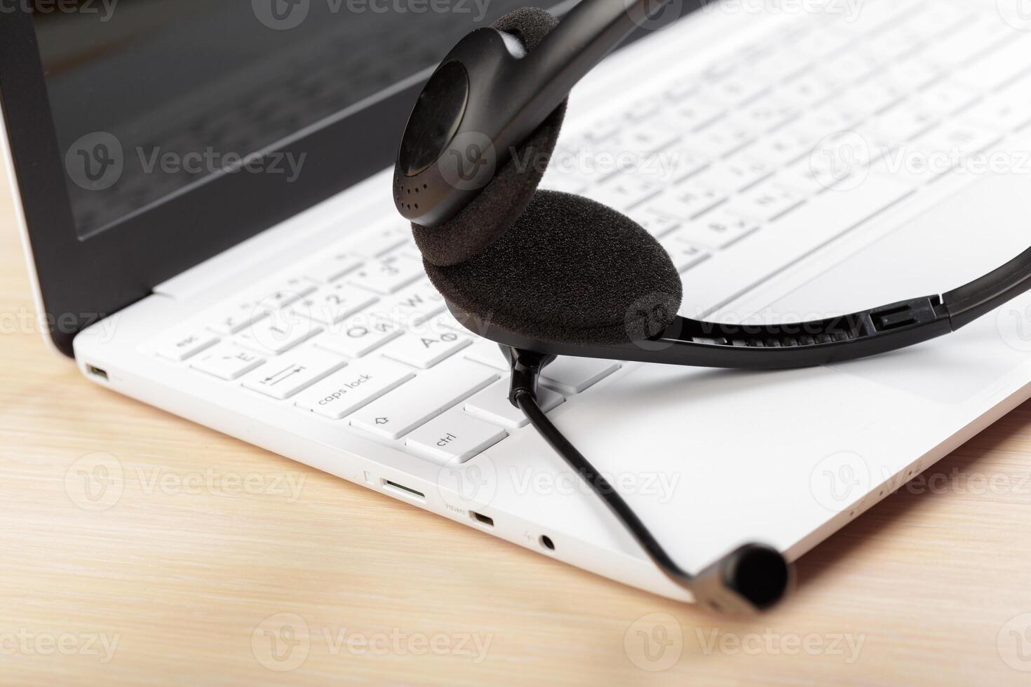 headset on keyboard computer laptop photo