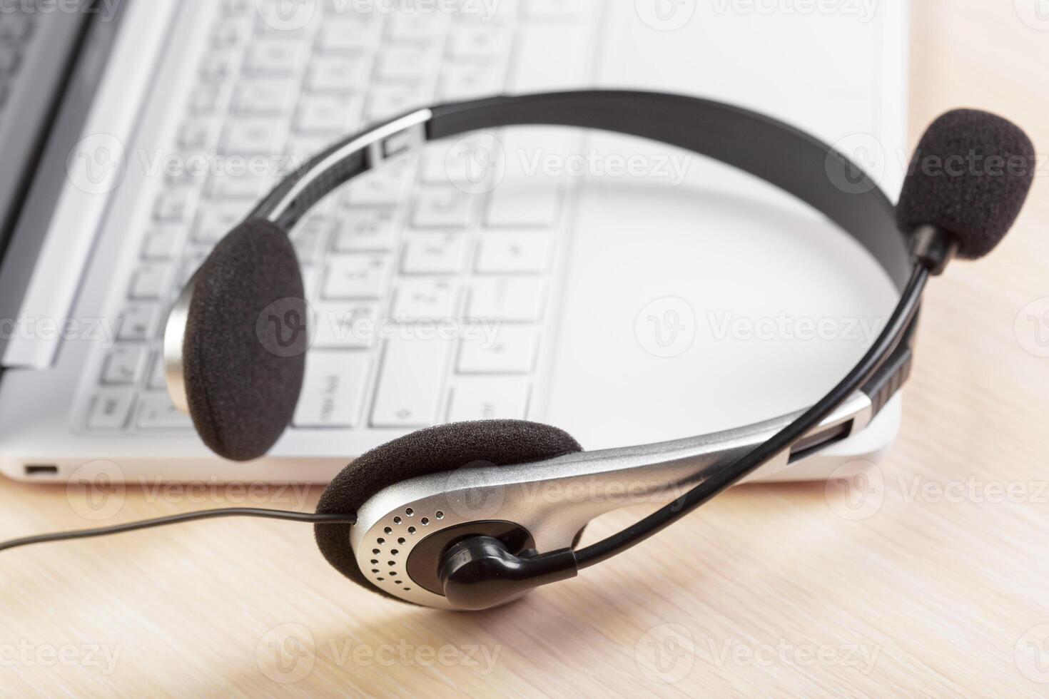 headset on keyboard computer laptop photo