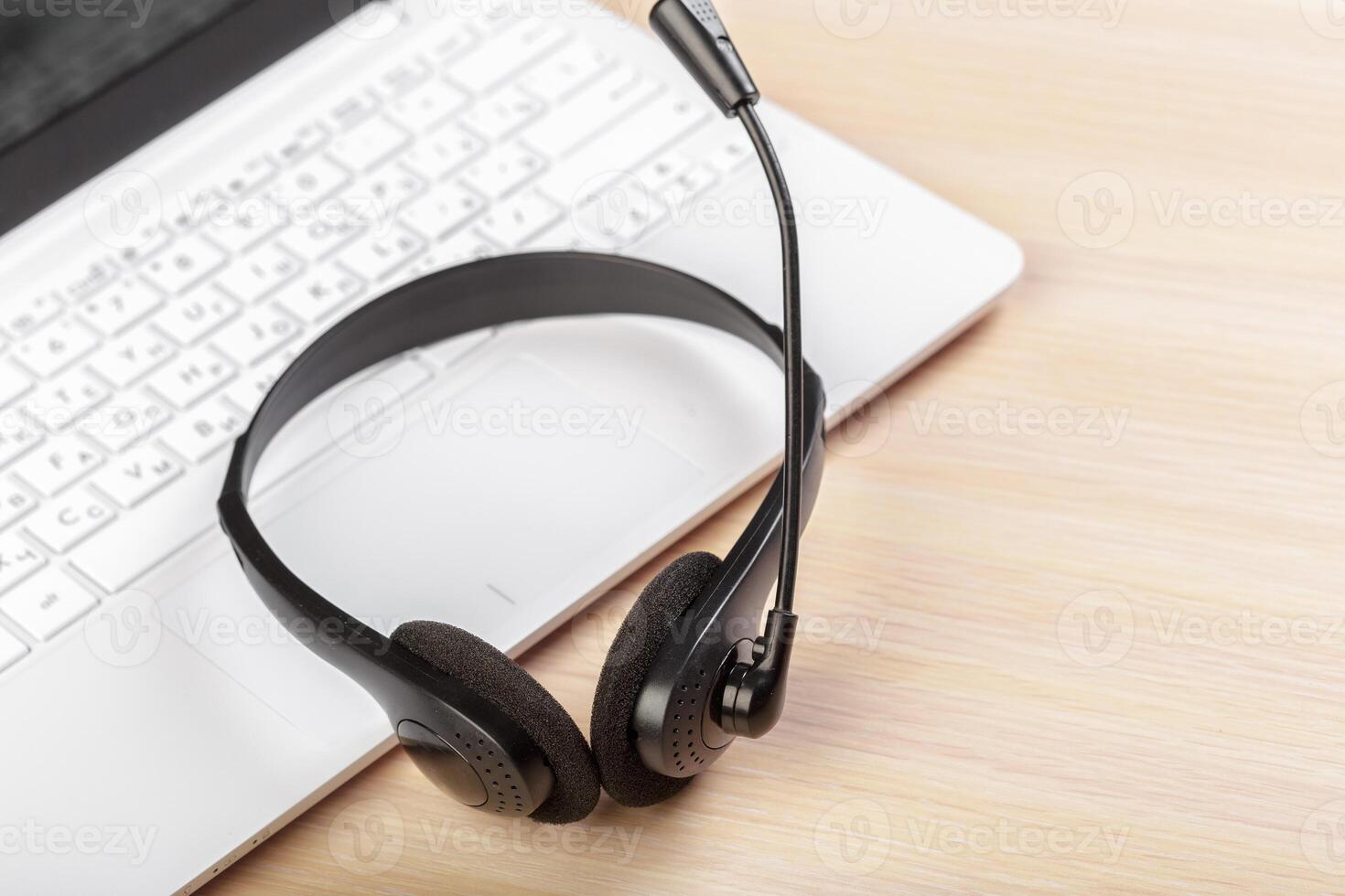 headset on keyboard computer laptop photo