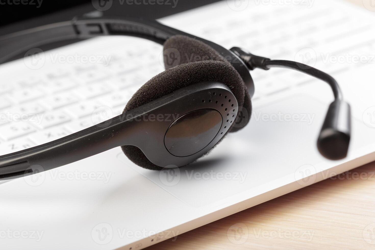 headset on keyboard computer laptop photo