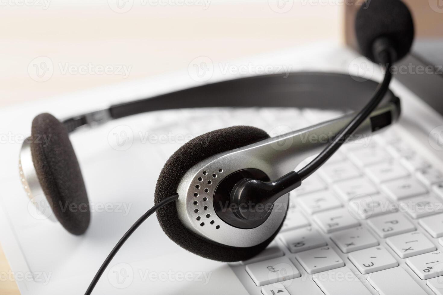 headset on keyboard computer laptop photo
