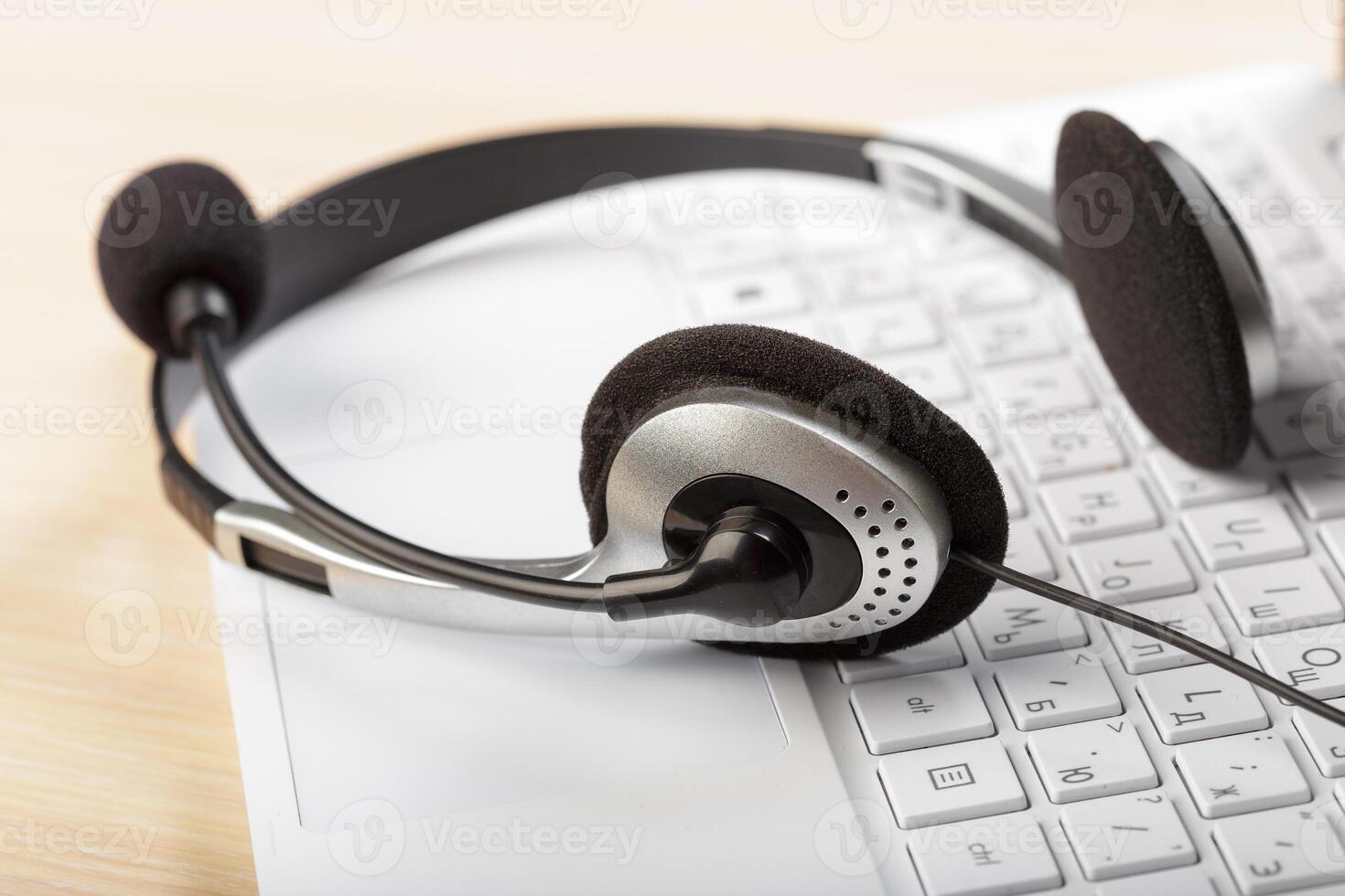 headset on keyboard computer laptop photo