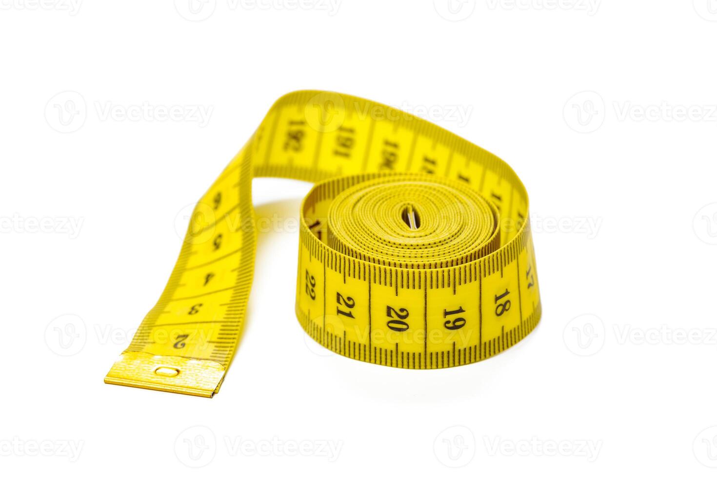 yellow metric measuring tape isolated on white panorama background photo
