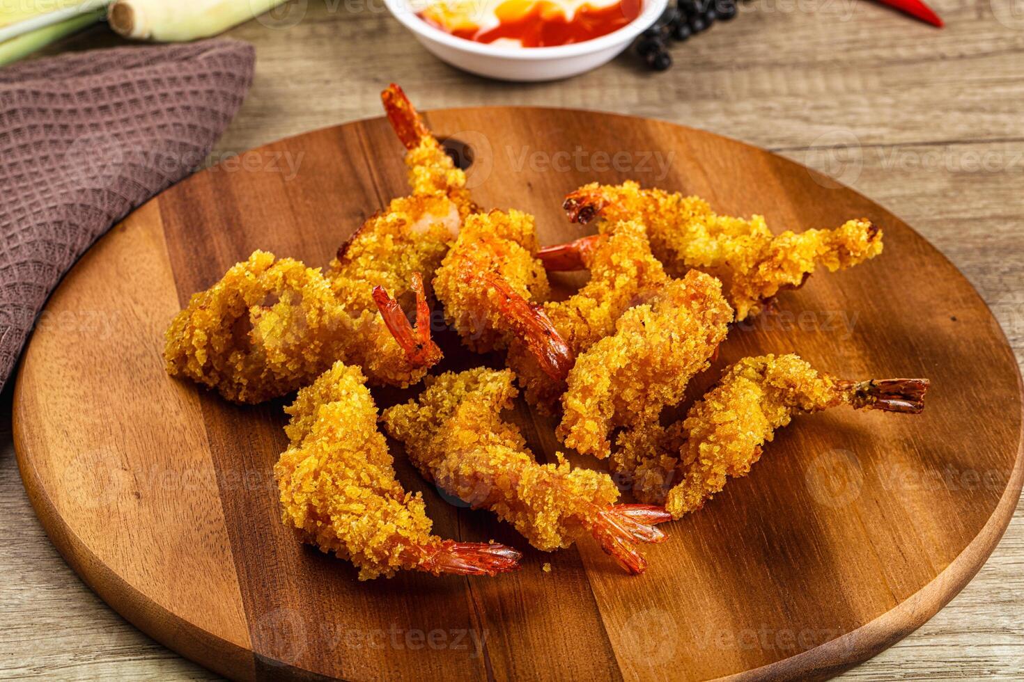 Golden deep prawn tempura wuth sauce photo