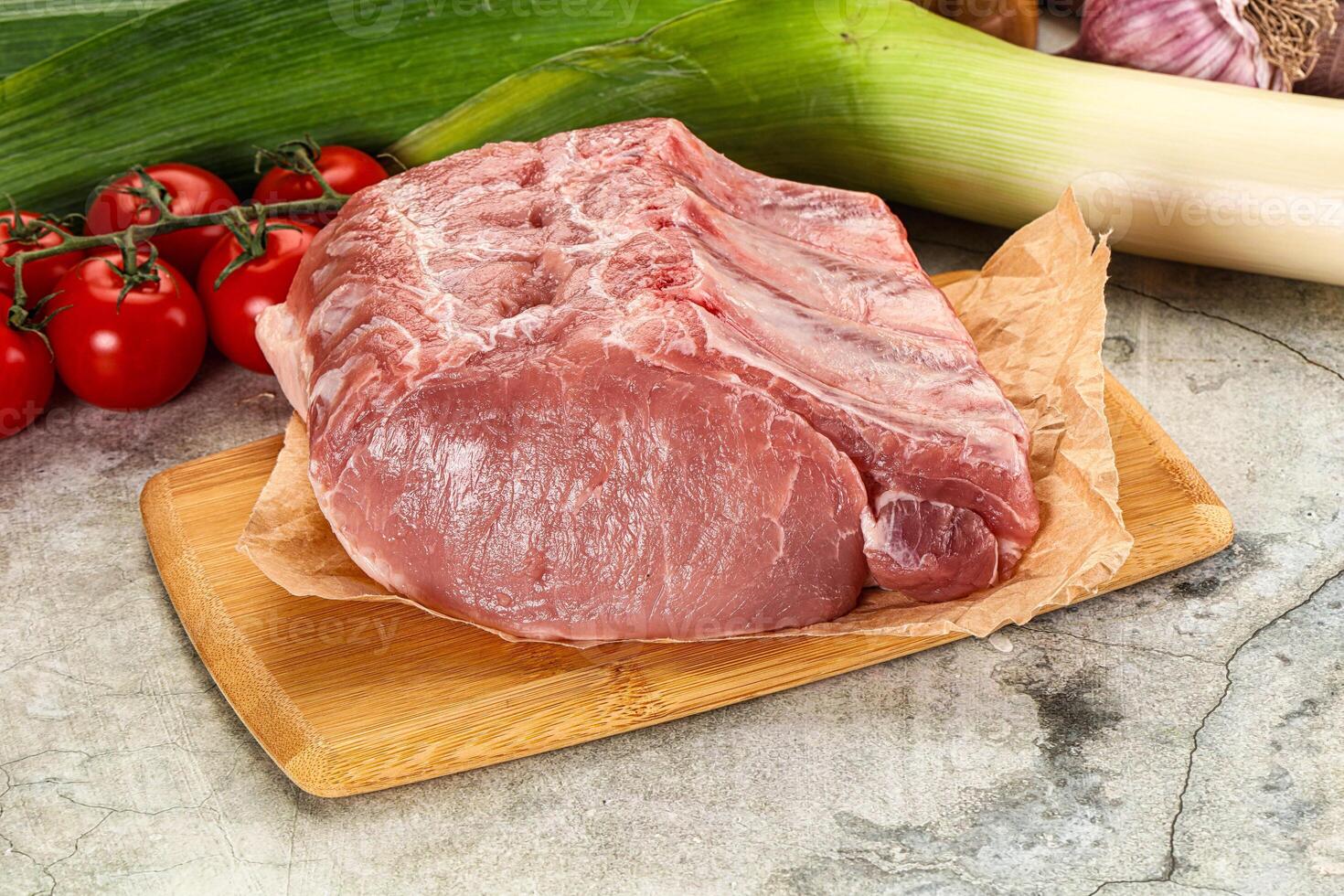 Raw pork loin cut with bone photo