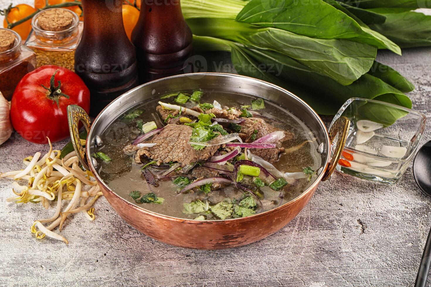 Vietnamese cuisine - Pho Bo soup with beef photo
