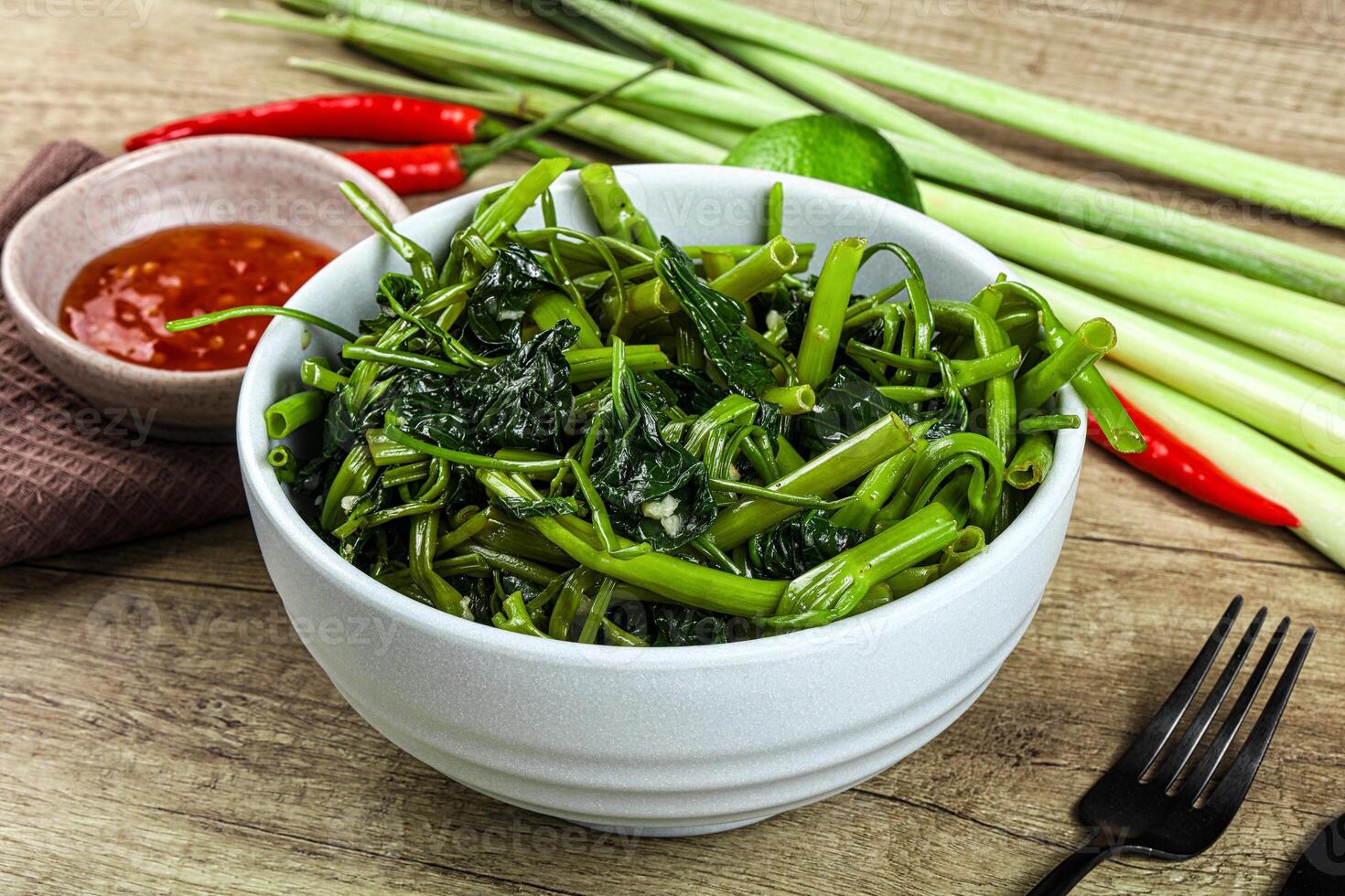 Asian cuisine stir fried morning glory photo