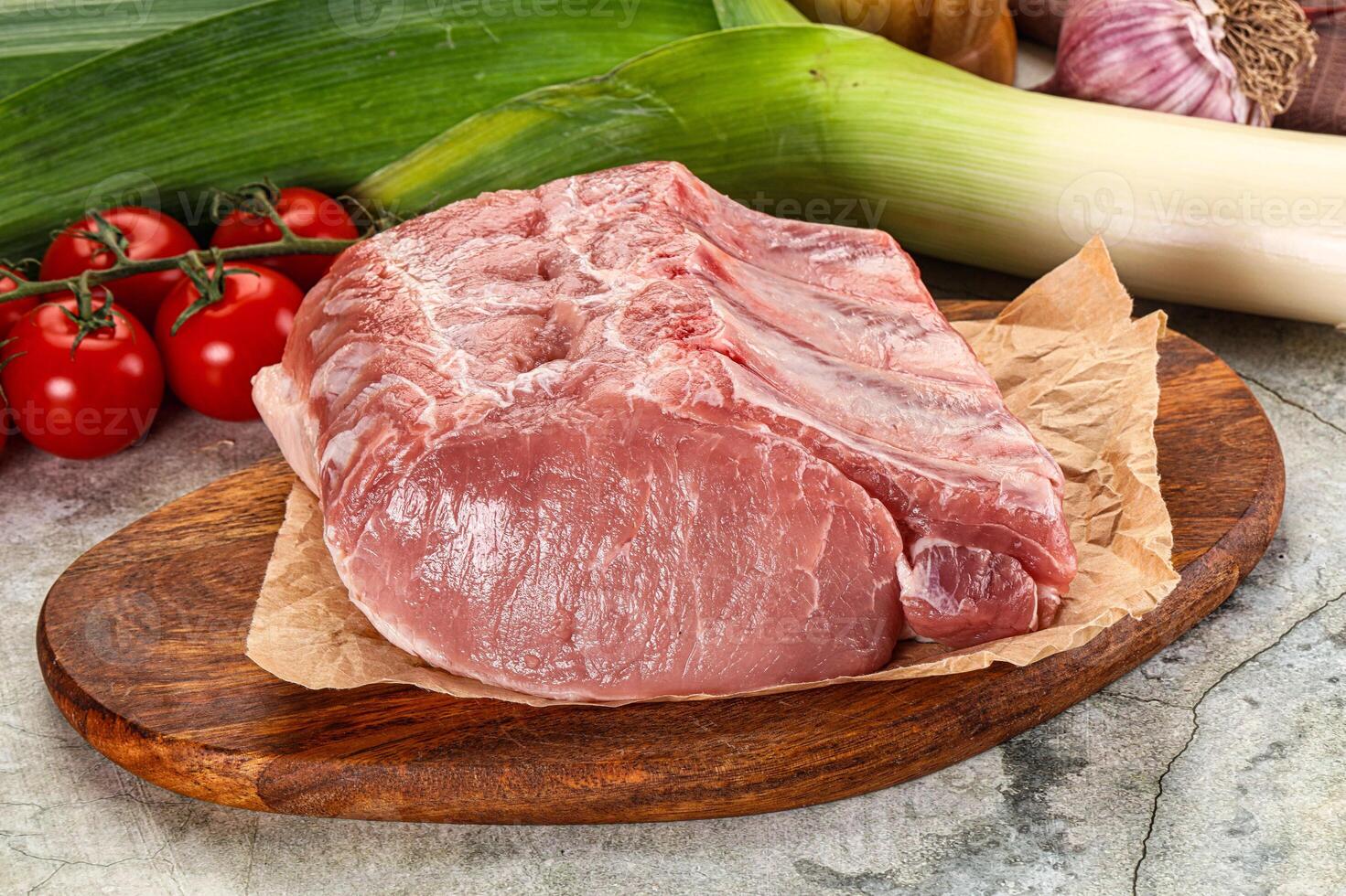 Raw pork loin cut with bone photo