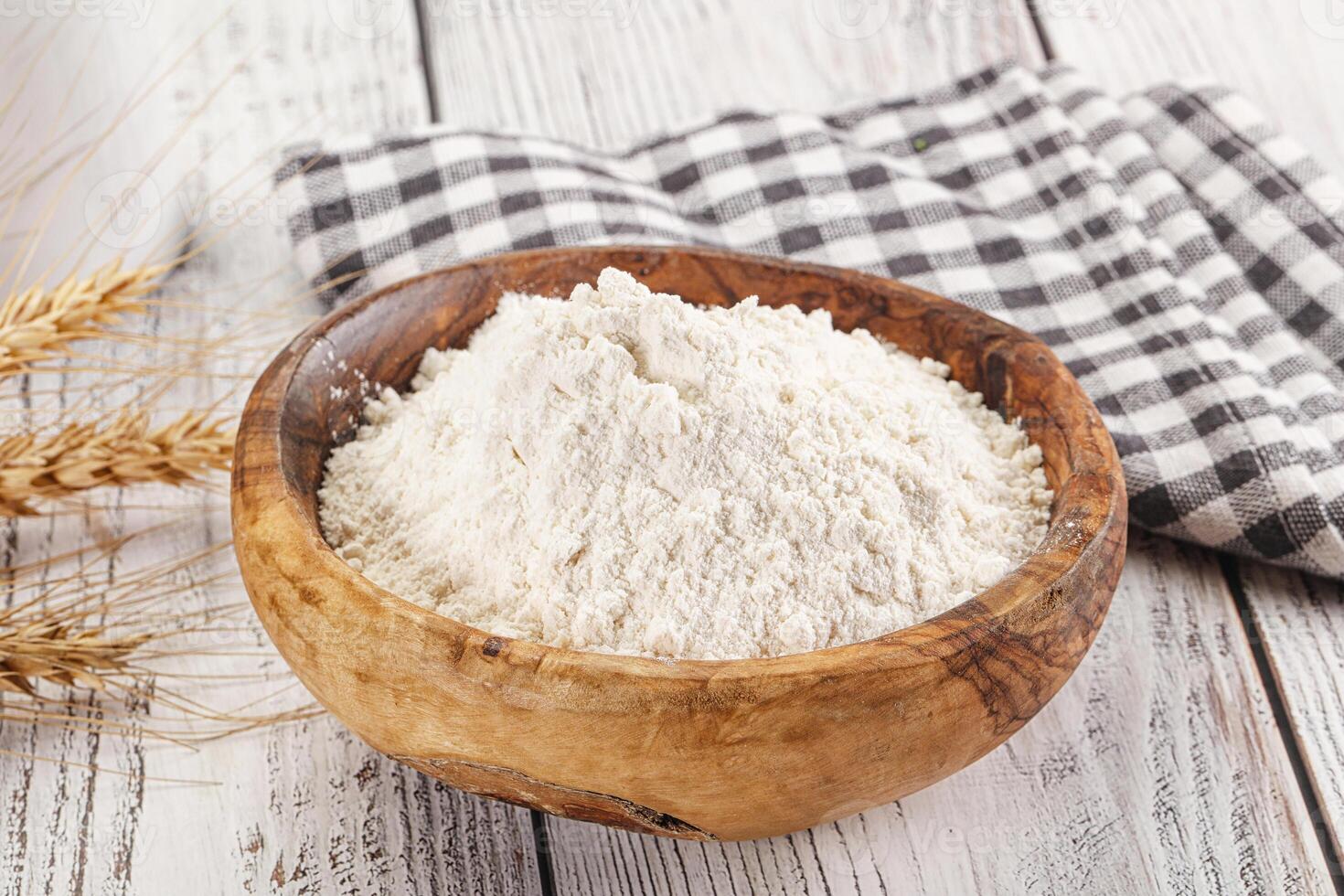 Wheat flour heap for bake photo