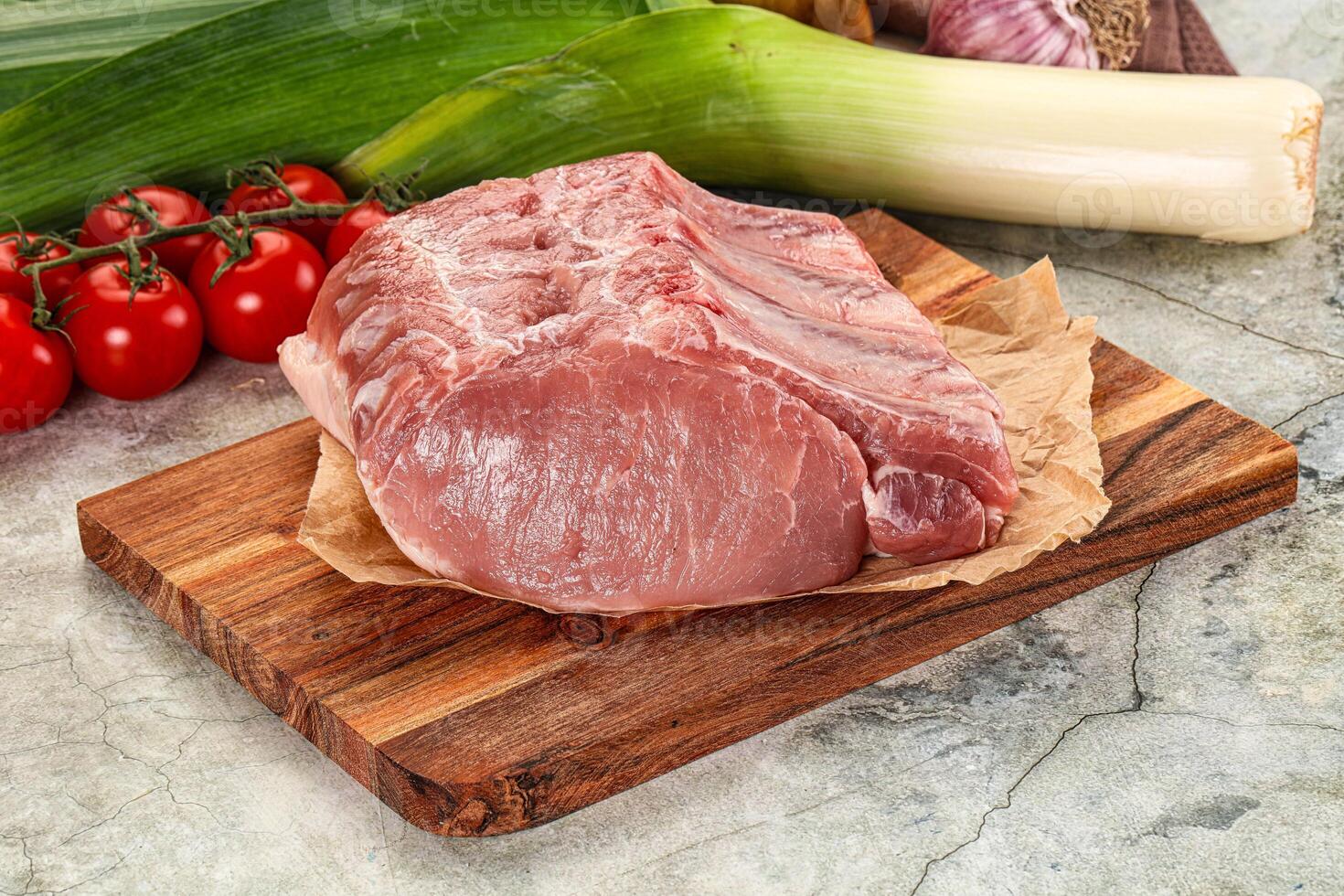 Raw pork loin cut with bone photo