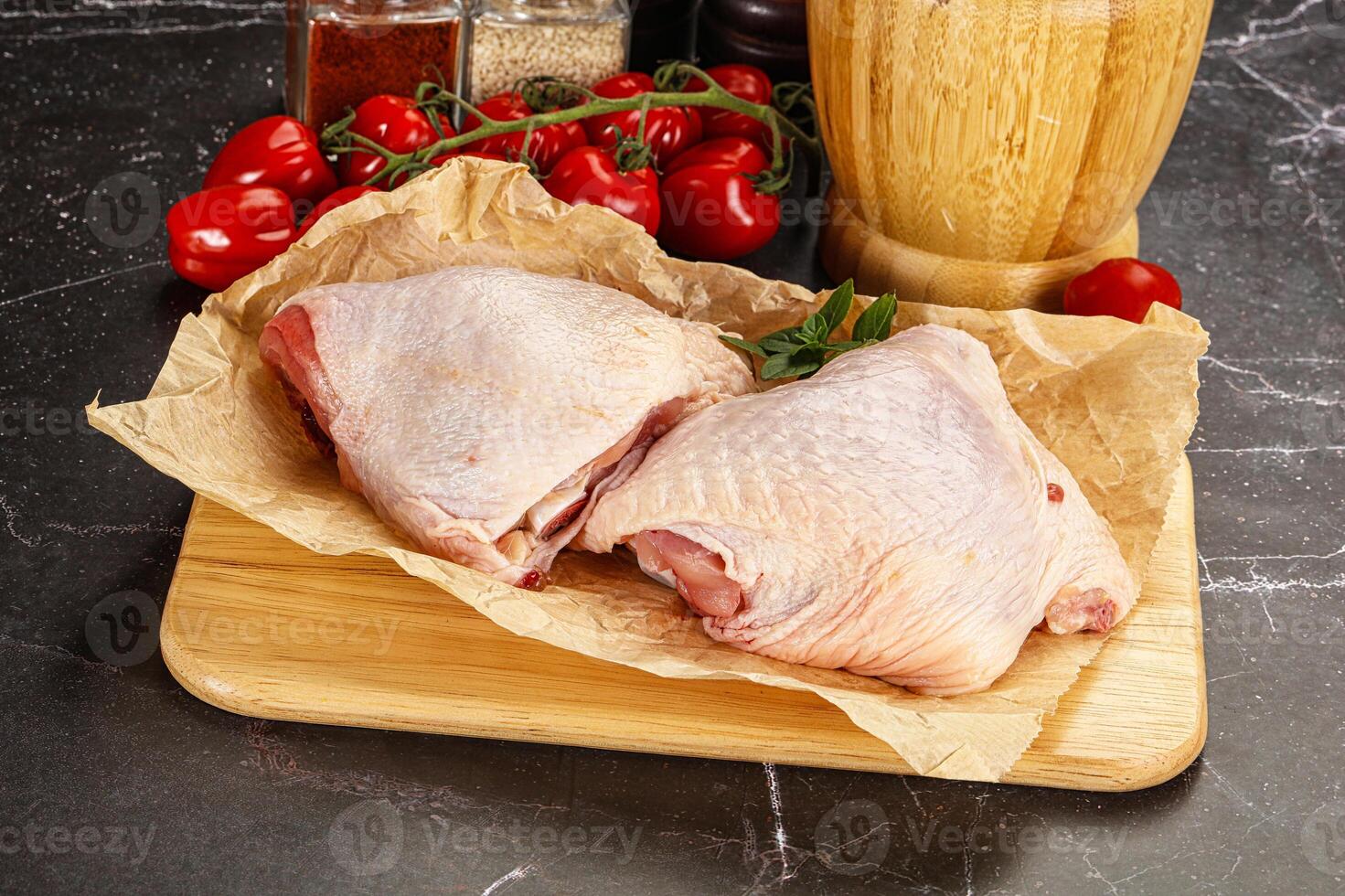 Raw chicken thigh for cooking photo