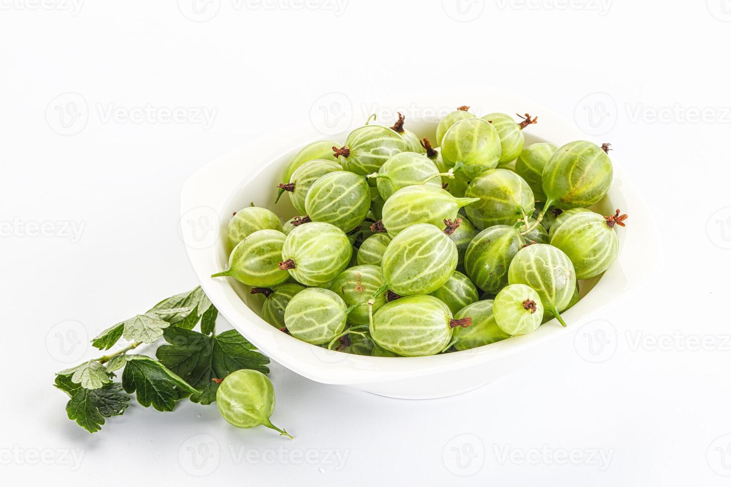 Sweet ripe gooseberries in the bowl photo