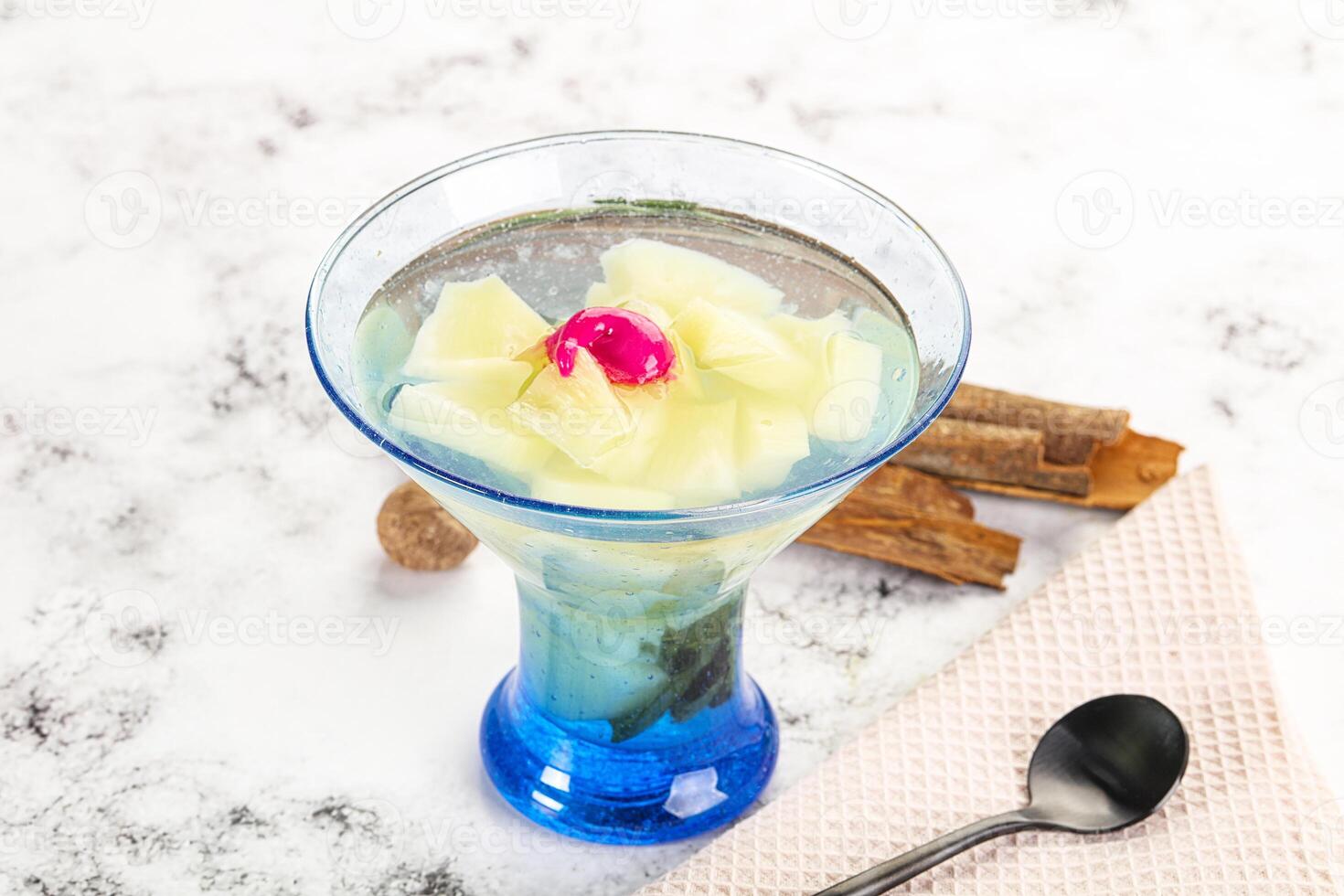 Sweet pineapple jelly with mint photo