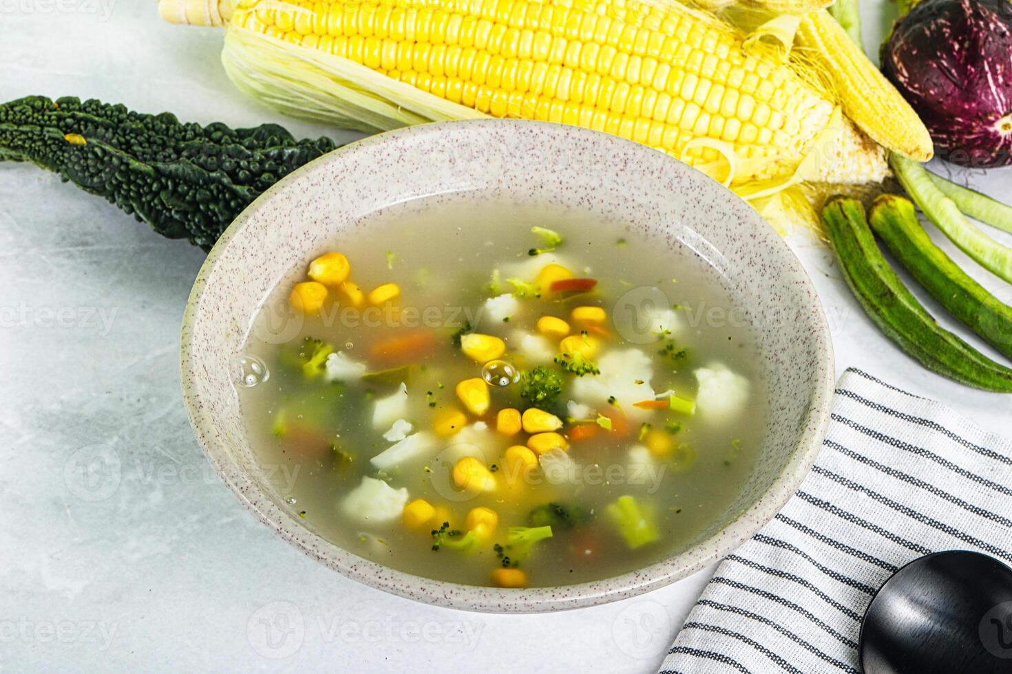 Soup with corn and broccoli photo