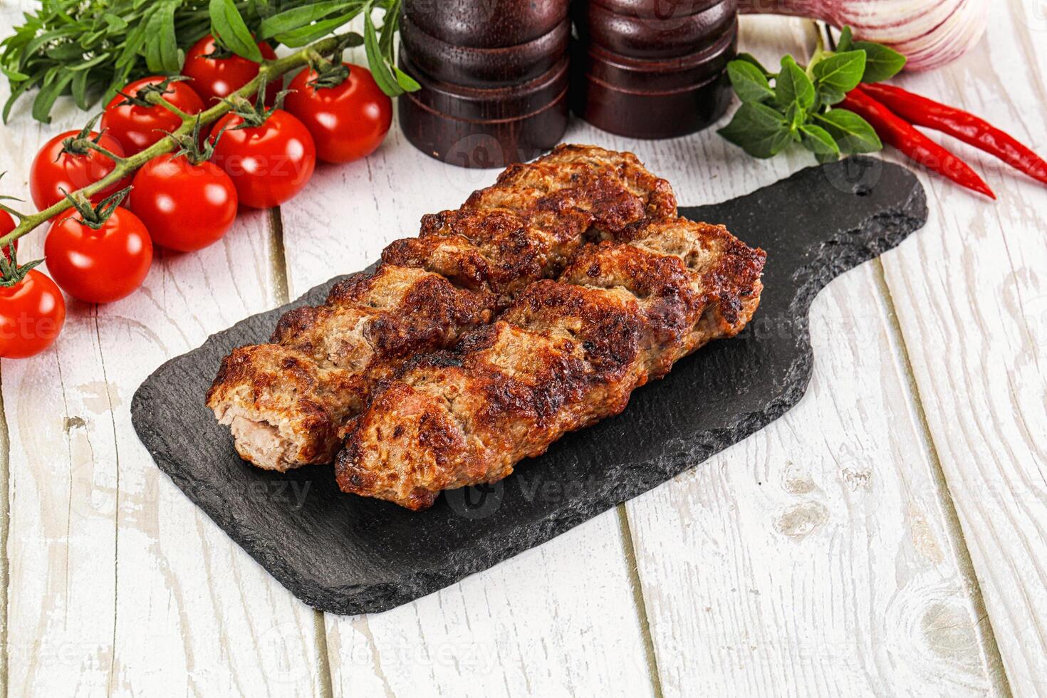Chicken kebab minced meat and spices photo