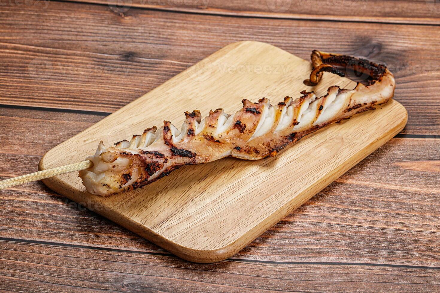 Delicous tasty Grilled octopus tentacle photo