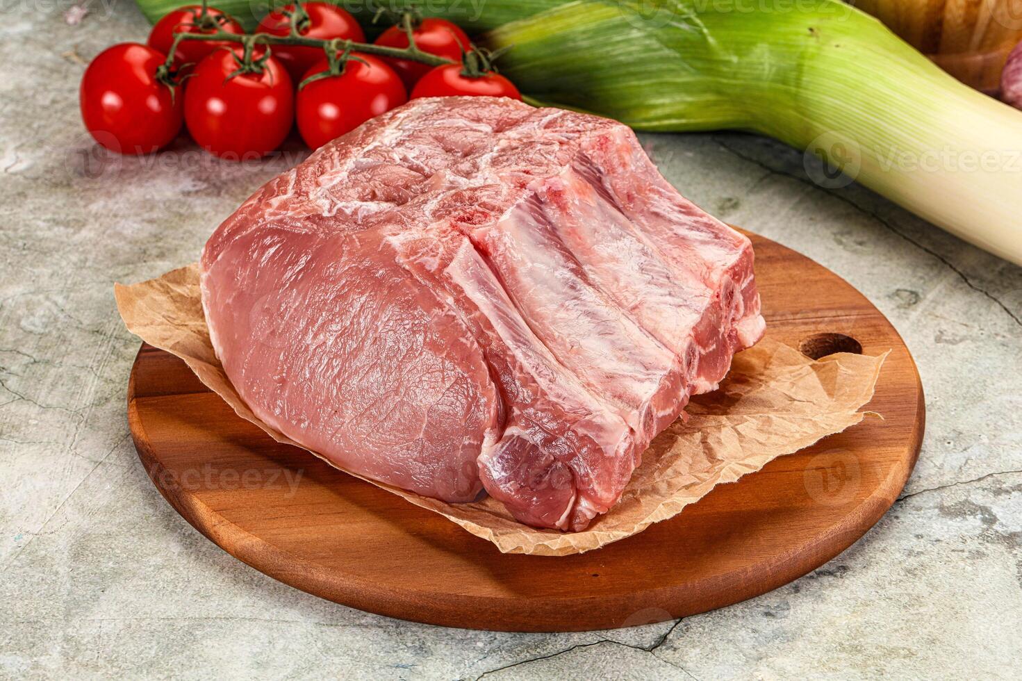 Raw pork loin cut with bone photo