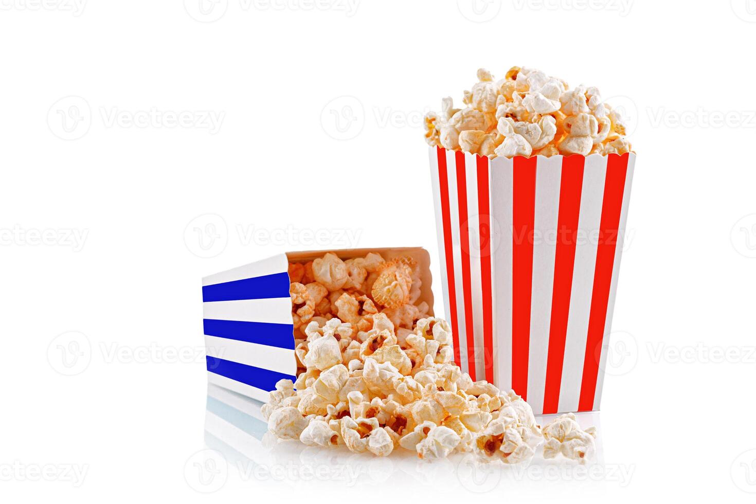 Glass with popcorn on a white background photo