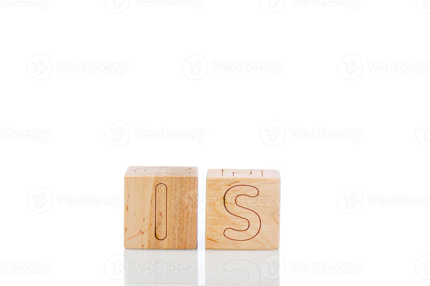 Wooden cubes with letters is on a white background photo