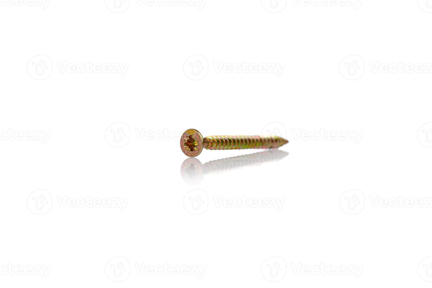 macro screw of golden color on a white background photo