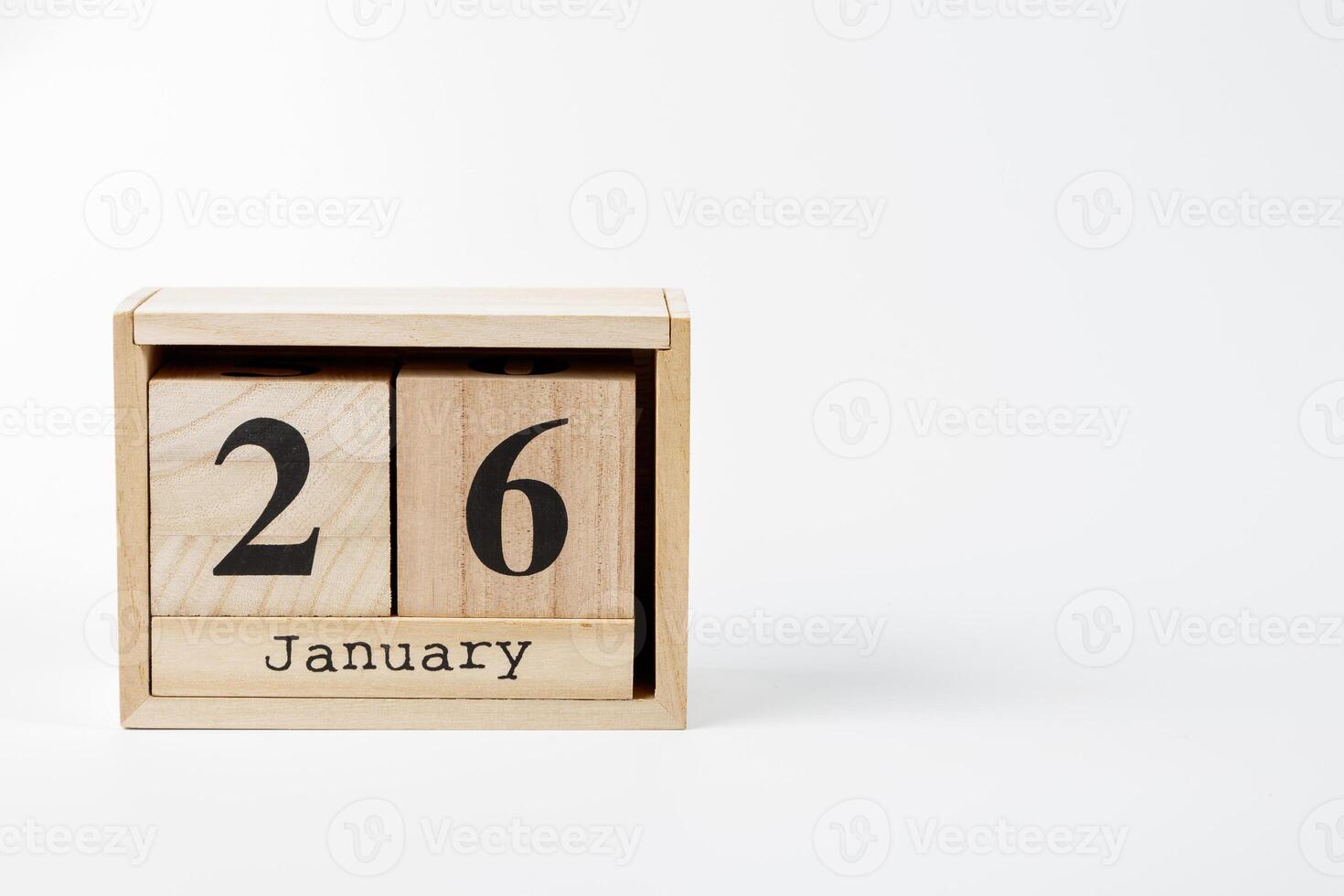 Wooden calendar January 26 on a white background photo