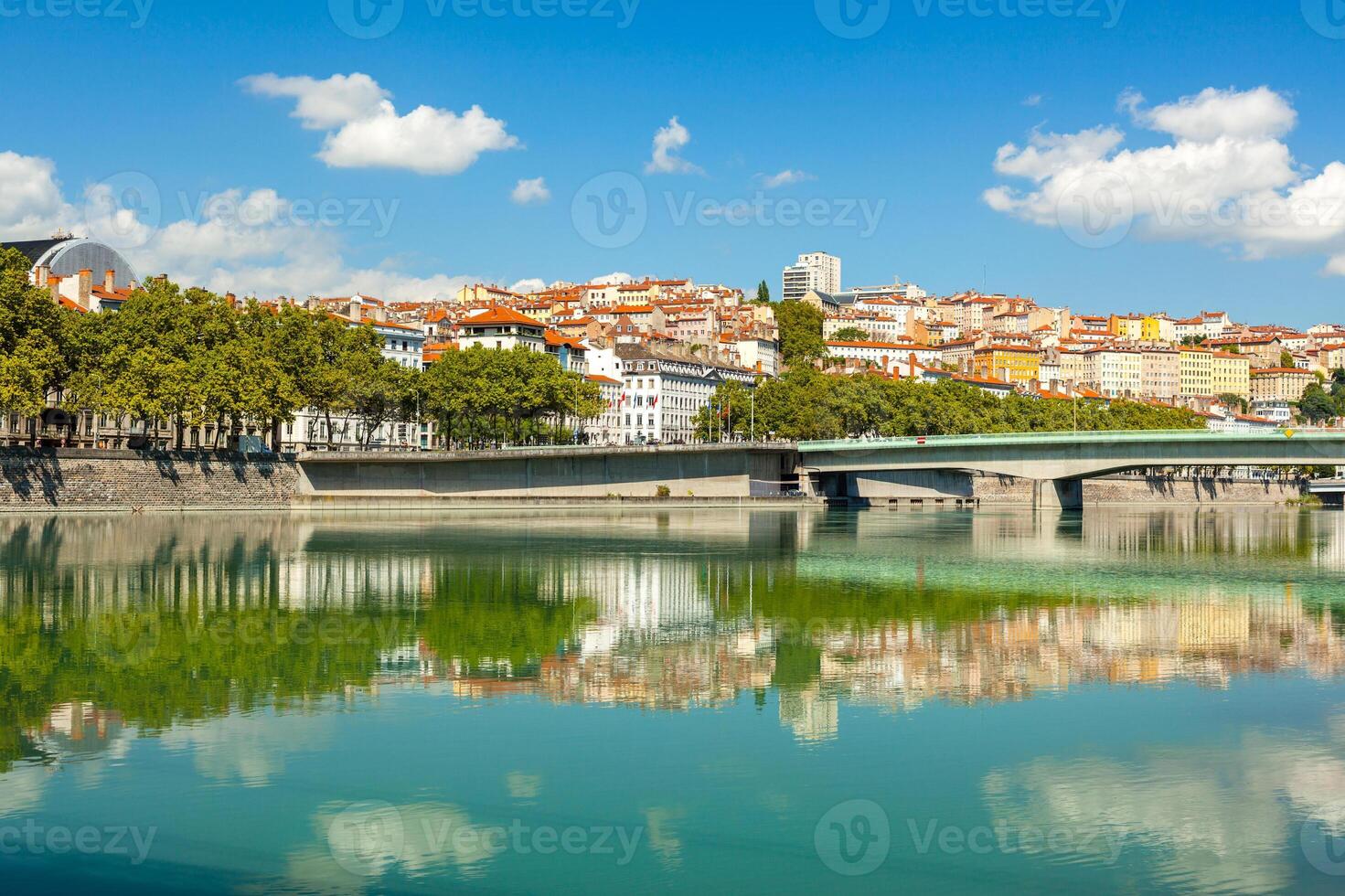 Cityscape of Lyon, France with reflections in the water photo